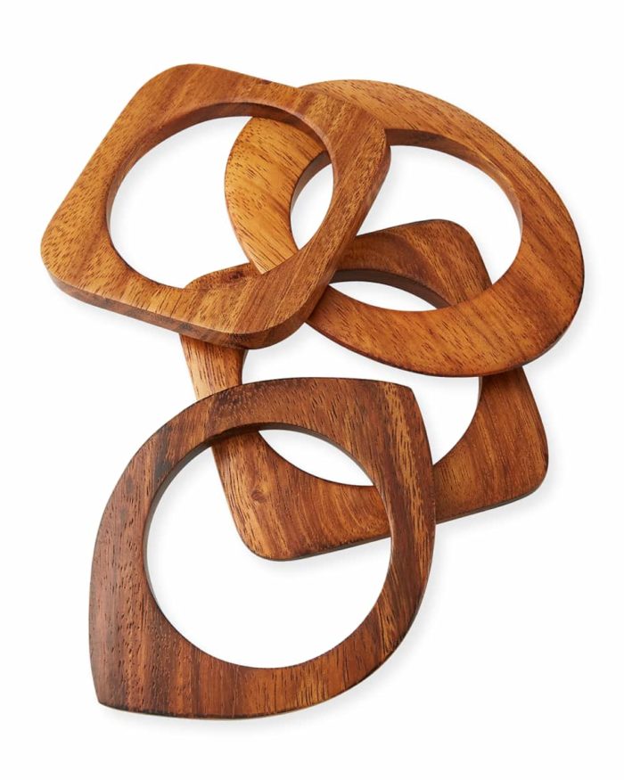 Four geometric-shaped wooden bangles from Kenneth Jay Lane